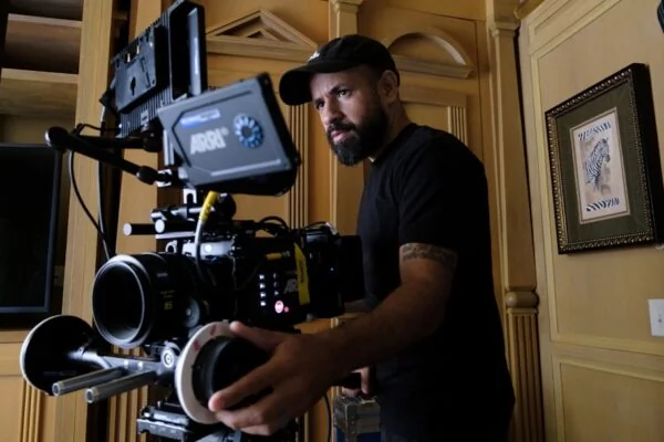 a man standing in front of a camera