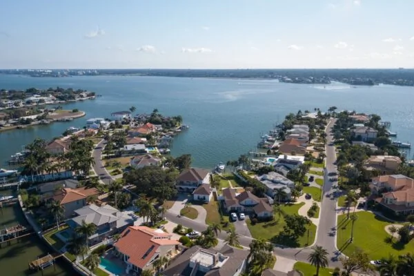 a large body of water surrounded by houses