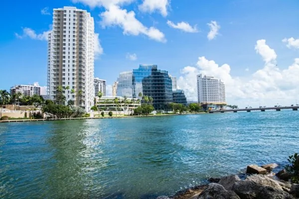 High-rise buildings stand along the beautiful waterfront.