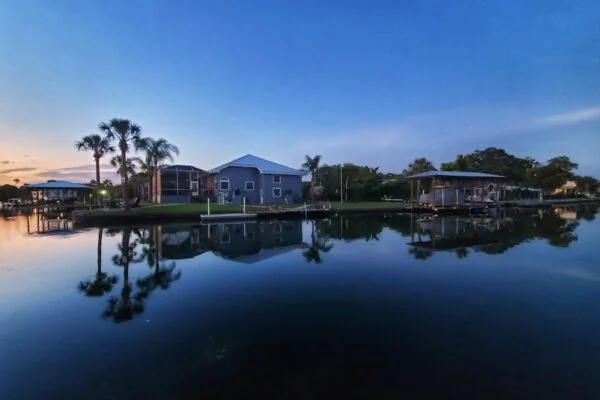 a body of water with buildings along it