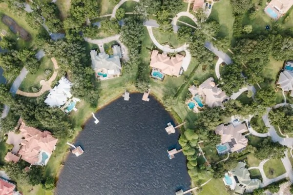 aerial photography of body of water surrounded with buildings